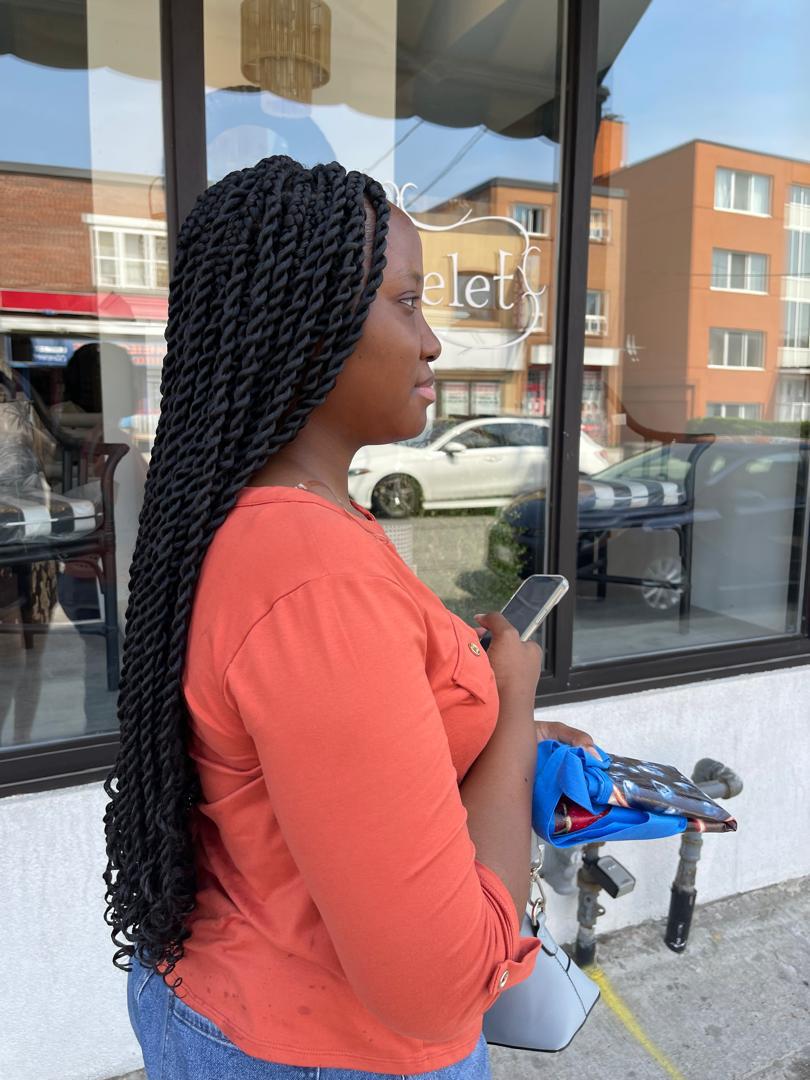 Close-up portrait with neat knotless braids